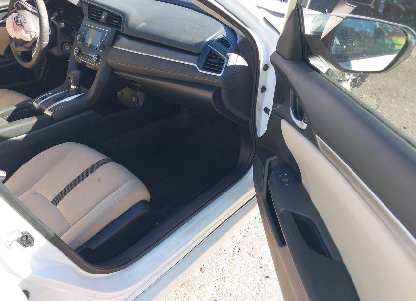 Photo 5 of 2018 Honda Civic LX (VIN 19XFC2F50JE008303)