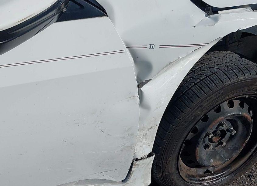 Photo 6 of 2018 Honda Civic LX (VIN 19XFC2F50JE008303)