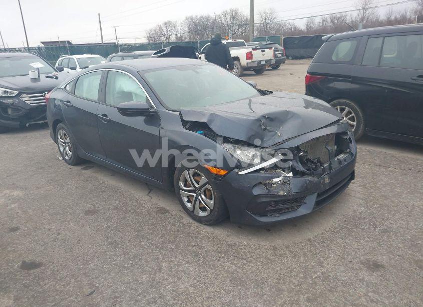 2018 Honda Civic LX (VIN 19XFC2F50JE009340) main photo