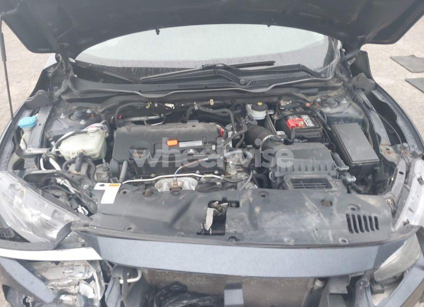 Photo 10 of 2018 Honda Civic LX (VIN 19XFC2F50JE009340)