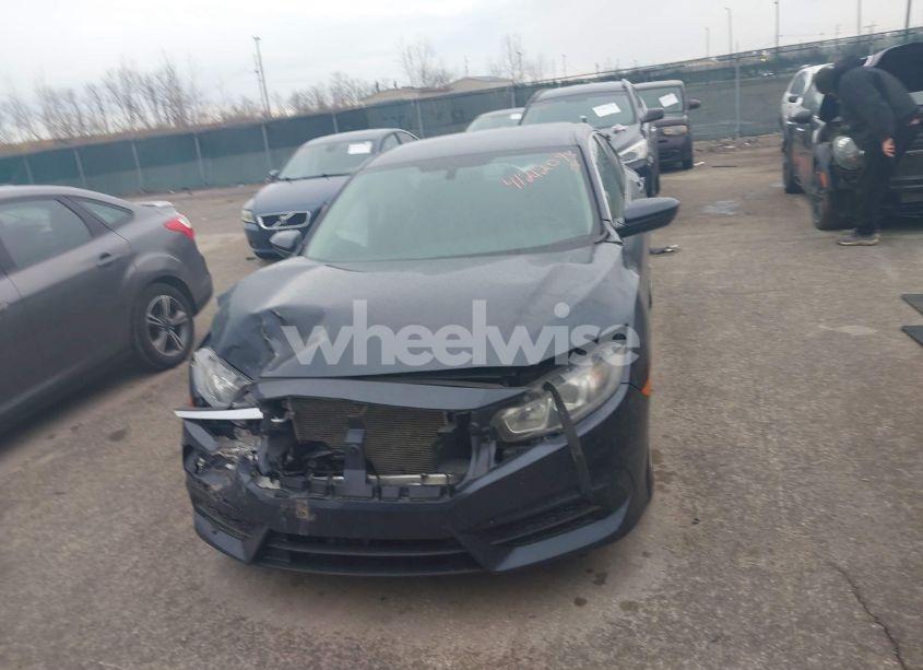 Photo 12 of 2018 Honda Civic LX (VIN 19XFC2F50JE009340)