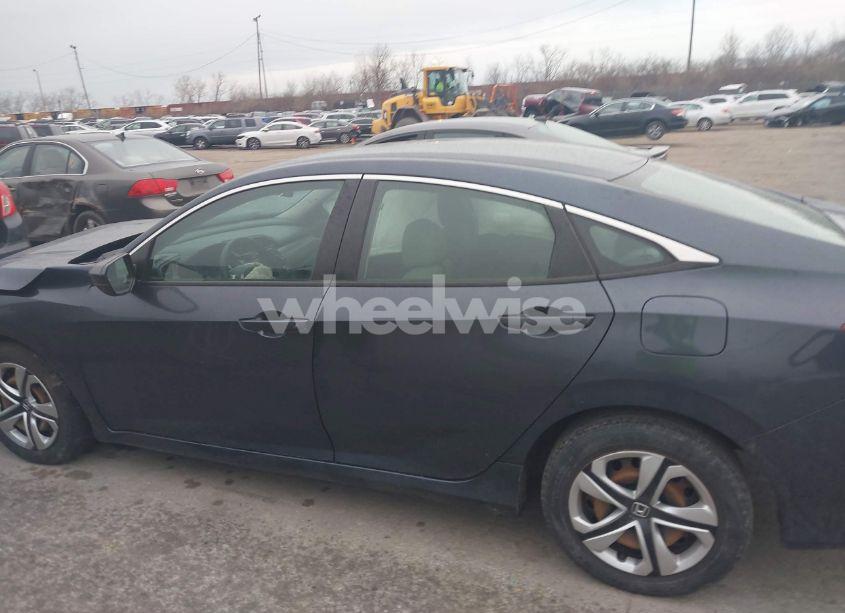 Photo 14 of 2018 Honda Civic LX (VIN 19XFC2F50JE009340)