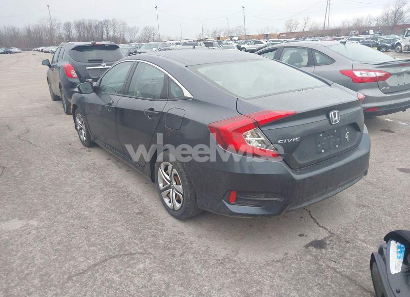 Photo 3 of 2018 Honda Civic LX (VIN 19XFC2F50JE009340)