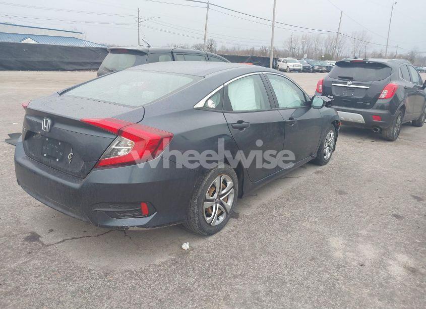 Photo 4 of 2018 Honda Civic LX (VIN 19XFC2F50JE009340)