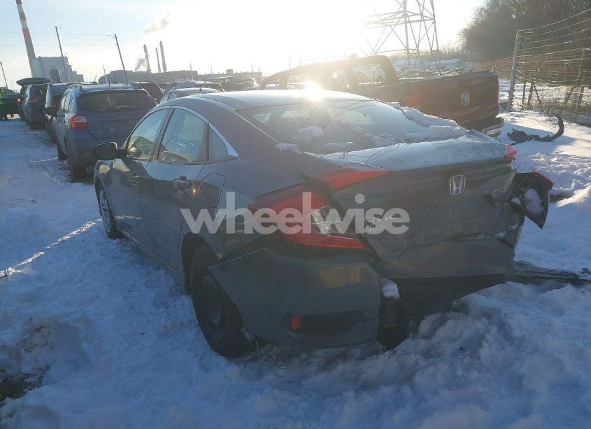 Photo 3 of 2018 Honda Civic LX (VIN 19XFC2F50JE013131)