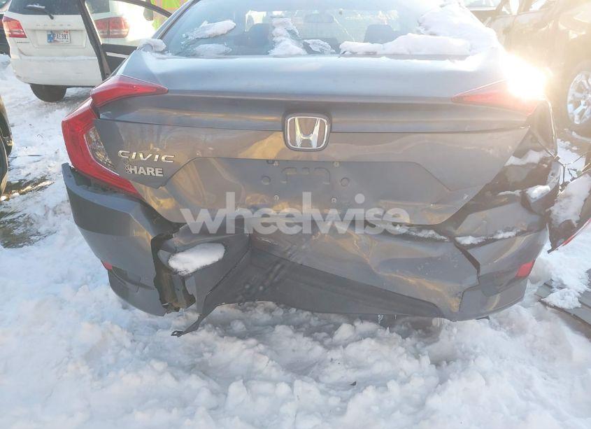 Photo 6 of 2018 Honda Civic LX (VIN 19XFC2F50JE013131)