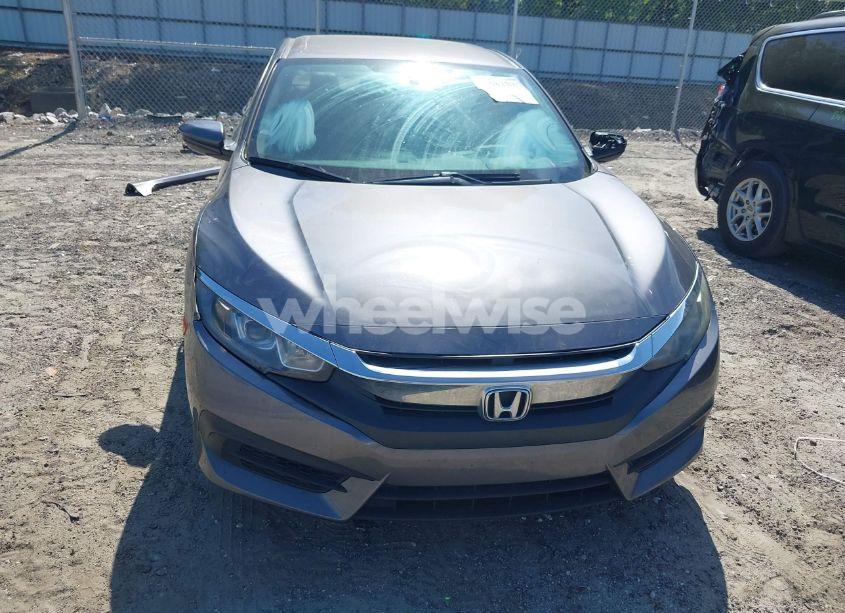 Photo 13 of 2018 Honda Civic LX (VIN 19XFC2F50JE014313)