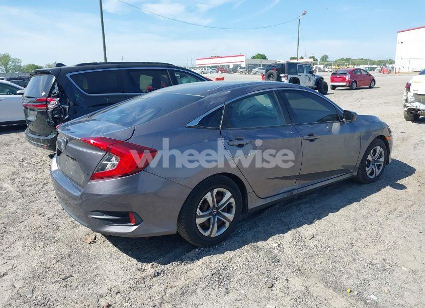 Photo 4 of 2018 Honda Civic LX (VIN 19XFC2F50JE014313)