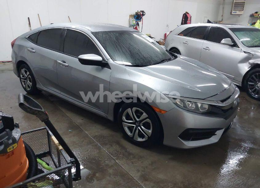 2018 Honda Civic LX (VIN 19XFC2F50JE021293) main photo