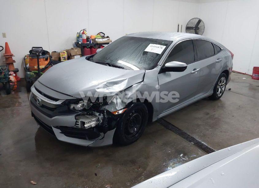 Photo 2 of 2018 Honda Civic LX (VIN 19XFC2F50JE021293)