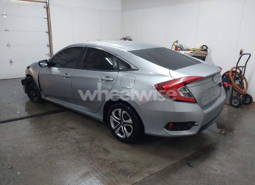 Photo 3 of 2018 Honda Civic LX (VIN 19XFC2F50JE021293)