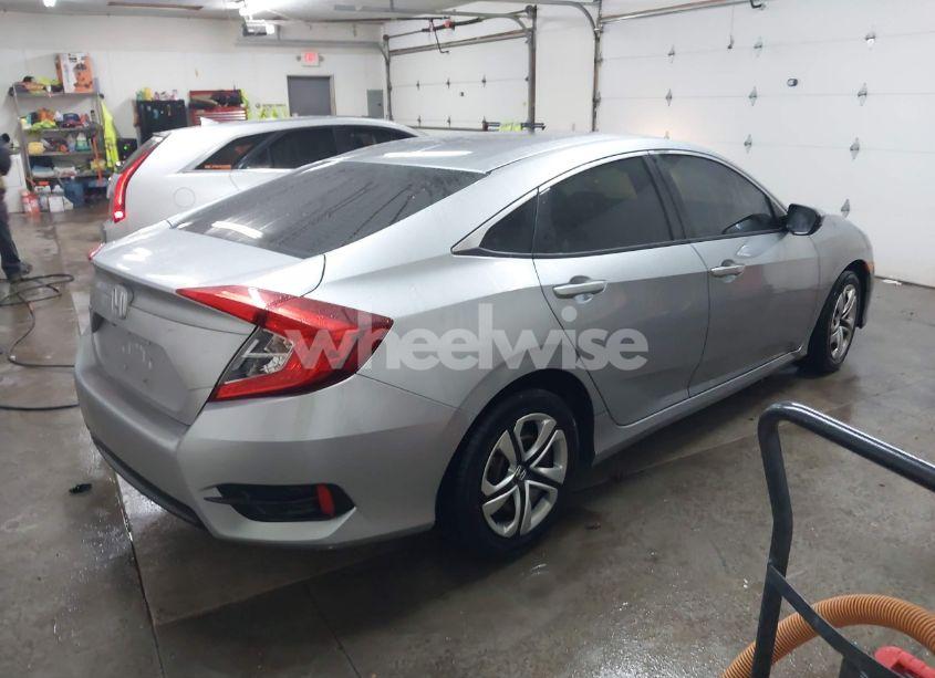 Photo 4 of 2018 Honda Civic LX (VIN 19XFC2F50JE021293)