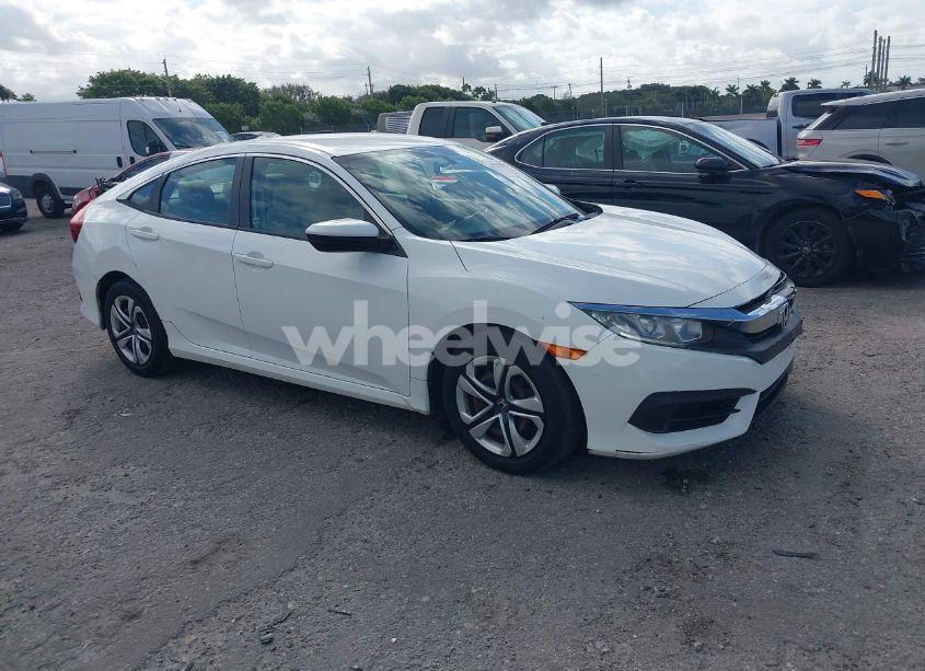 2018 Honda Civic LX (VIN 19XFC2F50JE023481) main photo