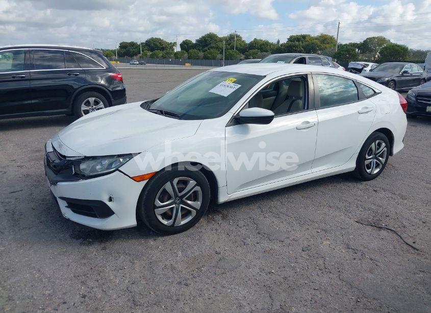 Photo 2 of 2018 Honda Civic LX (VIN 19XFC2F50JE023481)