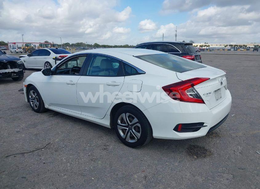 Photo 3 of 2018 Honda Civic LX (VIN 19XFC2F50JE023481)