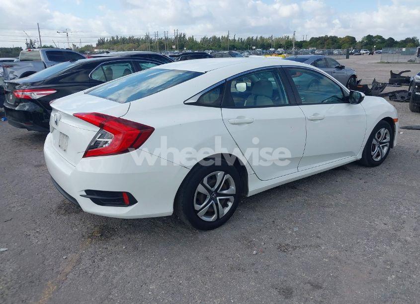 Photo 4 of 2018 Honda Civic LX (VIN 19XFC2F50JE023481)