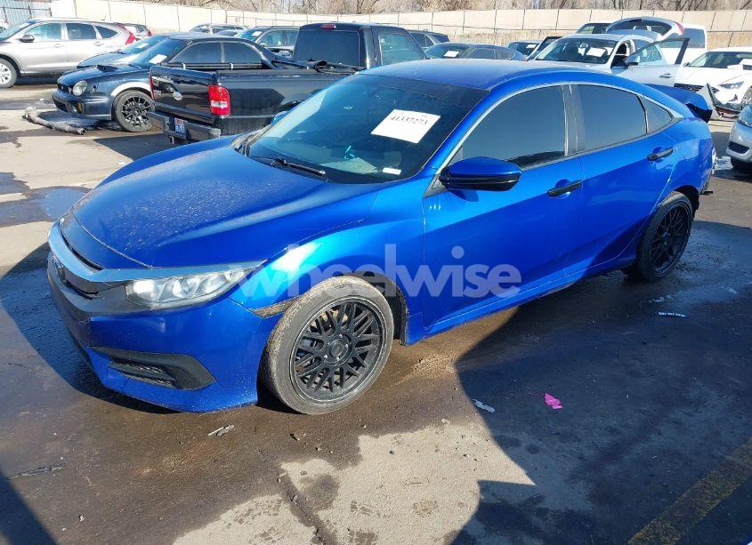 Photo 2 of 2018 Honda Civic LX (VIN 19XFC2F50JE027739)