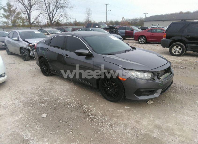 2018 Honda Civic LX (VIN 19XFC2F50JE028745) main photo