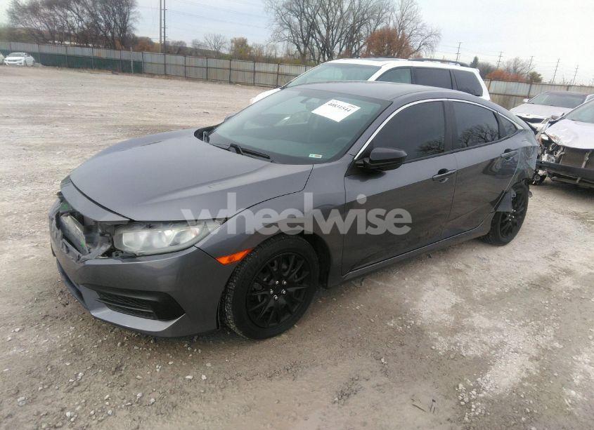 Photo 2 of 2018 Honda Civic LX (VIN 19XFC2F50JE028745)