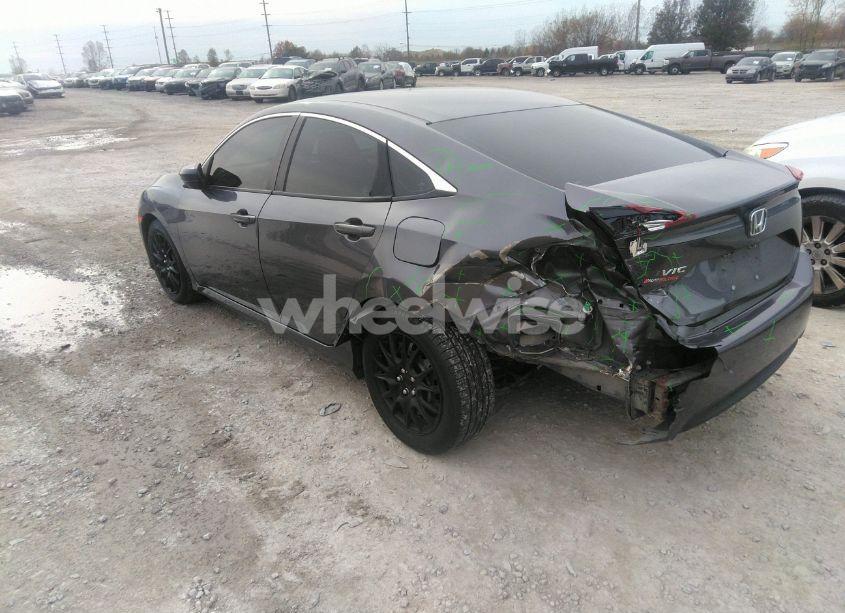 Photo 3 of 2018 Honda Civic LX (VIN 19XFC2F50JE028745)