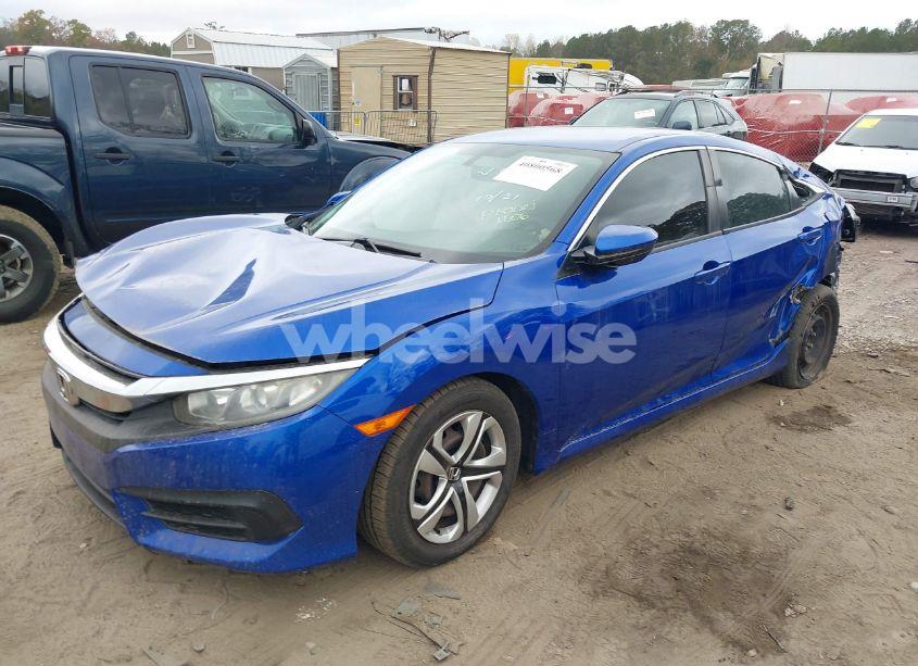 Photo 2 of 2018 Honda Civic LX (VIN 19XFC2F50JE029474)
