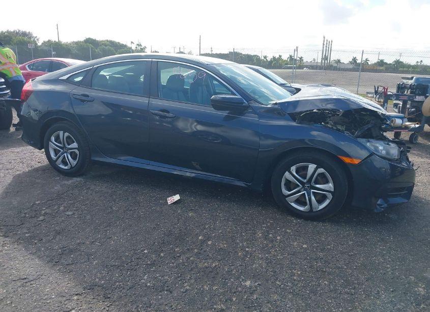 2018 Honda Civic LX (VIN 19XFC2F50JE040183) main photo