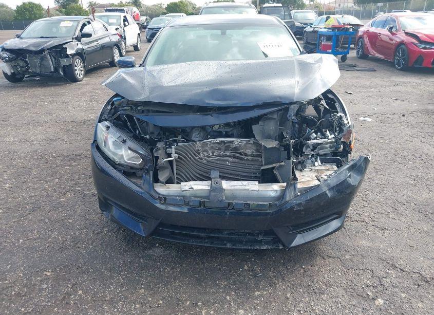 Photo 6 of 2018 Honda Civic LX (VIN 19XFC2F50JE040183)