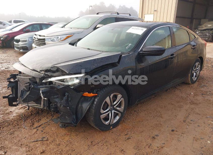 Photo 2 of 2017 Honda Civic LX (VIN 19XFC2F51HE012953)