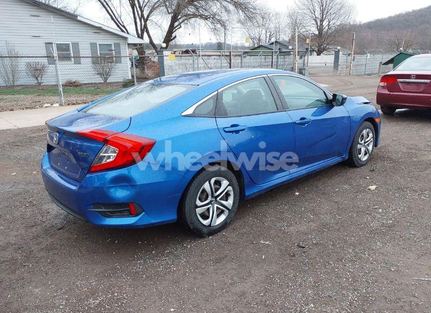 Photo 4 of 2017 Honda Civic LX (VIN 19XFC2F51HE075311)