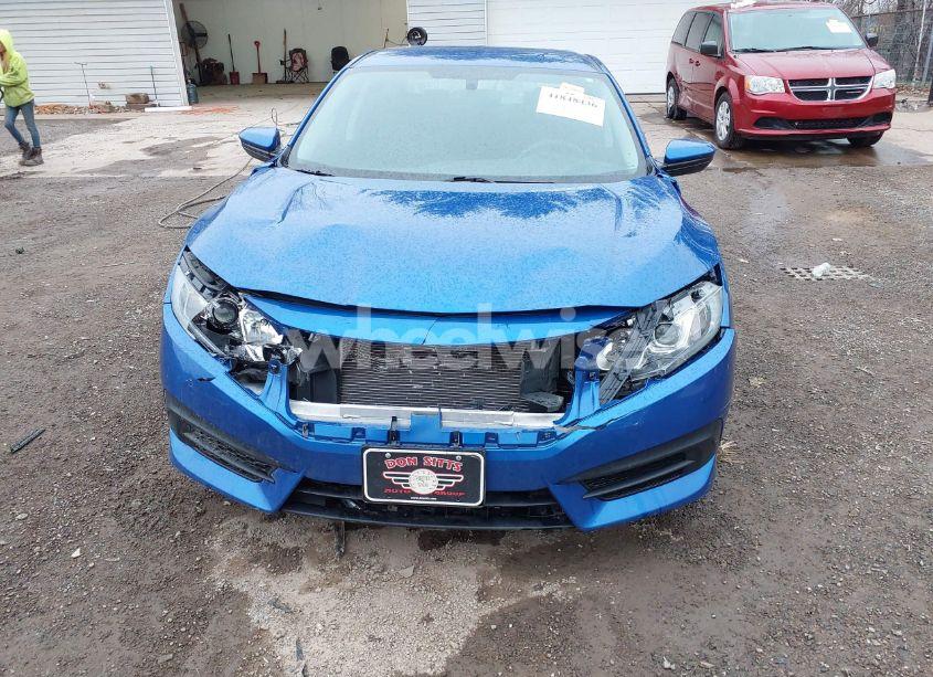 Photo 6 of 2017 Honda Civic LX (VIN 19XFC2F51HE075311)