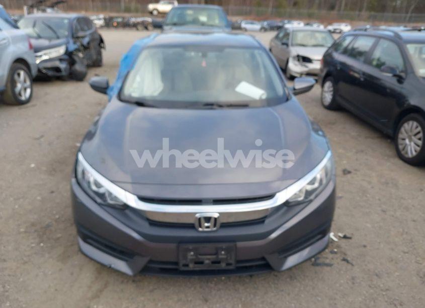 Photo 12 of 2017 Honda Civic LX (VIN 19XFC2F51HE205748)