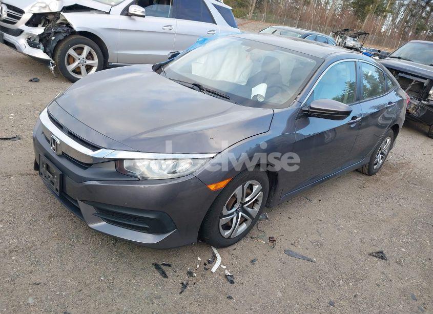 Photo 2 of 2017 Honda Civic LX (VIN 19XFC2F51HE205748)