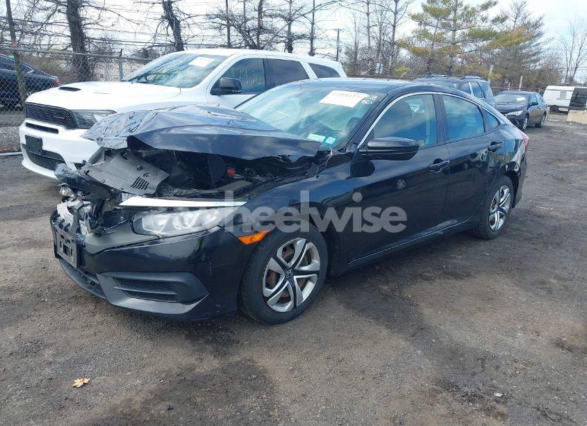 Photo 2 of 2017 Honda Civic LX (VIN 19XFC2F51HE224851)