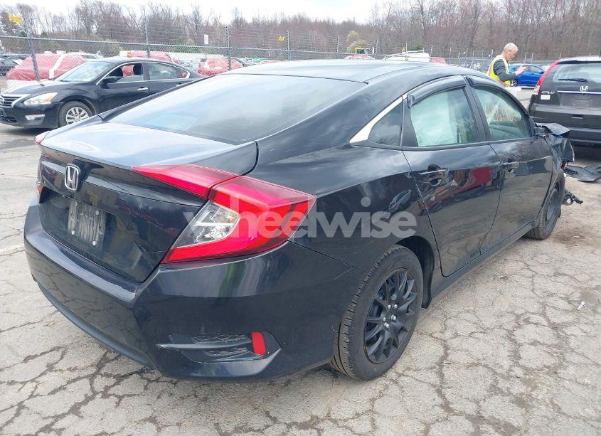 Photo 4 of 2017 Honda Civic LX (VIN 19XFC2F51HE230892)