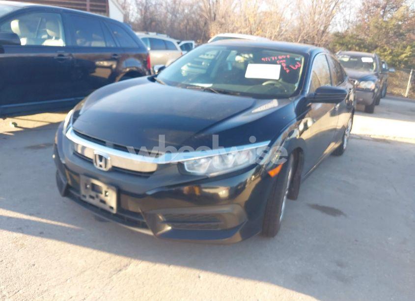 Photo 2 of 2018 Honda Civic LX (VIN 19XFC2F51JE003854)
