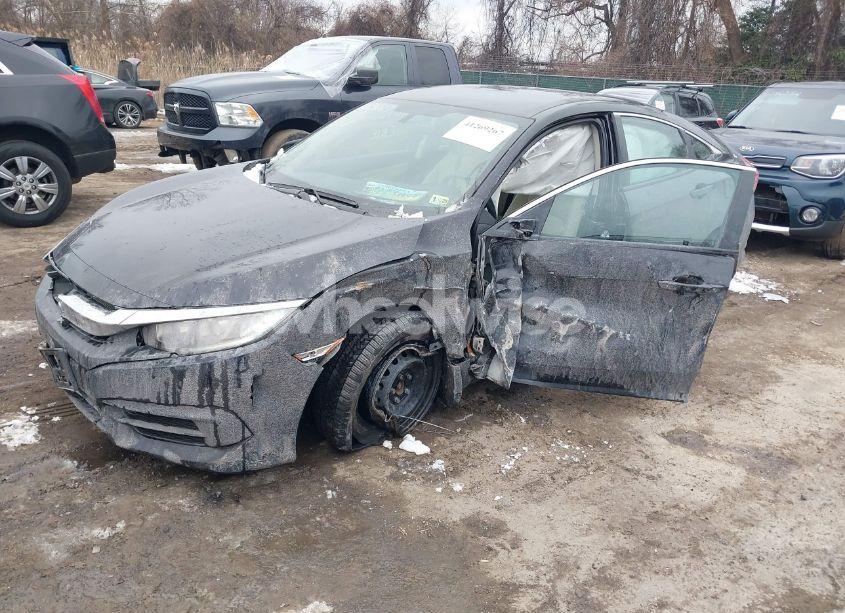 Photo 2 of 2018 Honda Civic LX (VIN 19XFC2F51JE013378)