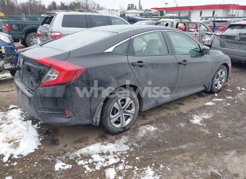 Photo 4 of 2018 Honda Civic LX (VIN 19XFC2F51JE013378)