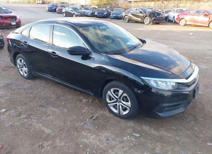 2018 Honda Civic LX (VIN 19XFC2F51JE021092) main photo