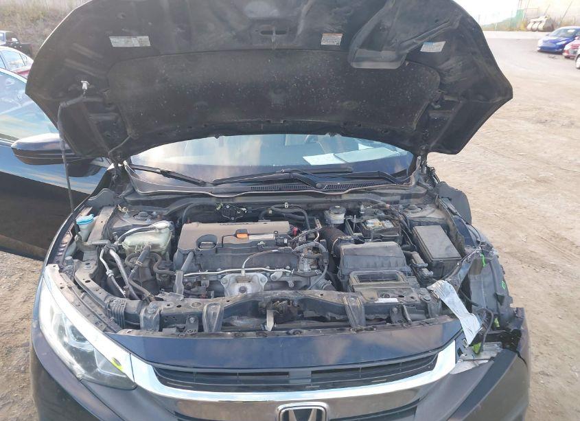 Photo 10 of 2018 Honda Civic LX (VIN 19XFC2F51JE021092)