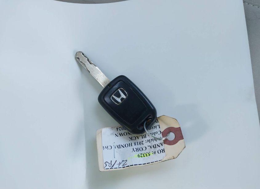 Photo 11 of 2018 Honda Civic LX (VIN 19XFC2F51JE021092)