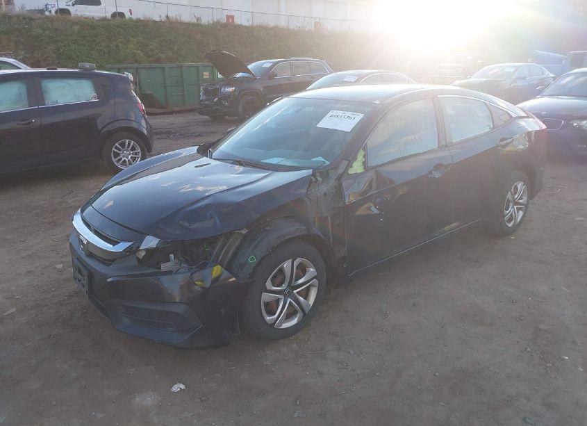 Photo 2 of 2018 Honda Civic LX (VIN 19XFC2F51JE021092)