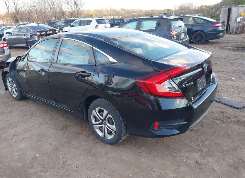 Photo 3 of 2018 Honda Civic LX (VIN 19XFC2F51JE021092)