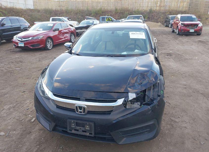 Photo 6 of 2018 Honda Civic LX (VIN 19XFC2F51JE021092)
