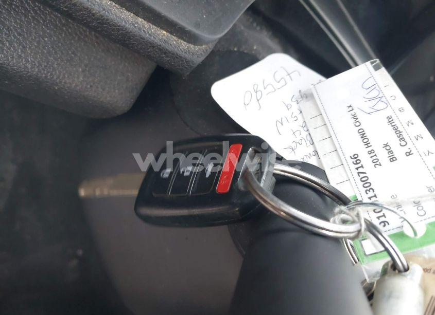 Photo 11 of 2018 Honda Civic LX (VIN 19XFC2F51JE022839)