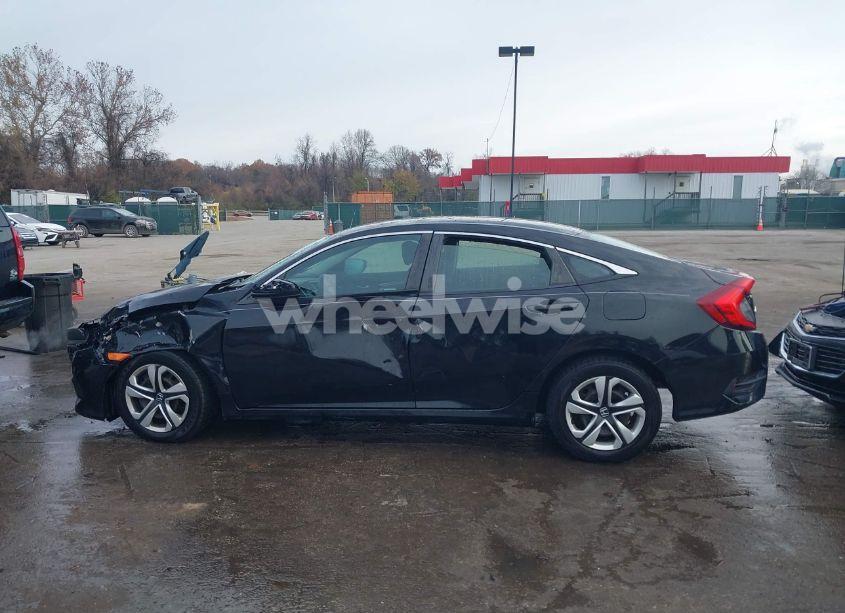 Photo 14 of 2018 Honda Civic LX (VIN 19XFC2F51JE022839)