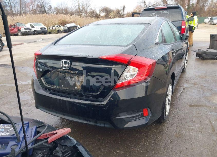 Photo 16 of 2018 Honda Civic LX (VIN 19XFC2F51JE022839)