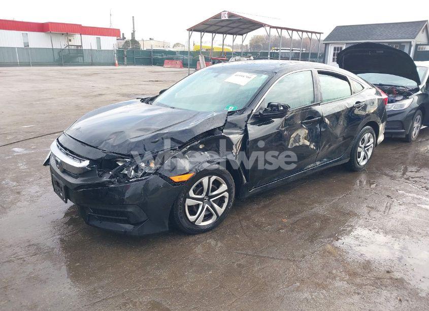 Photo 2 of 2018 Honda Civic LX (VIN 19XFC2F51JE022839)