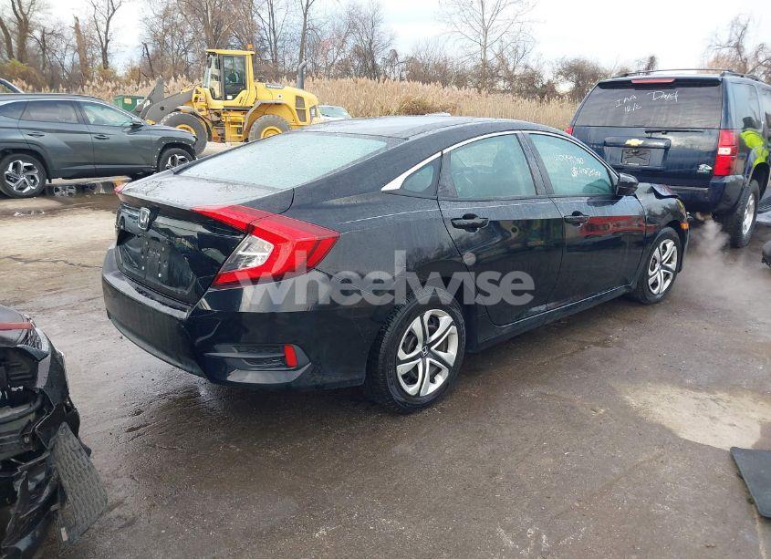 Photo 4 of 2018 Honda Civic LX (VIN 19XFC2F51JE022839)