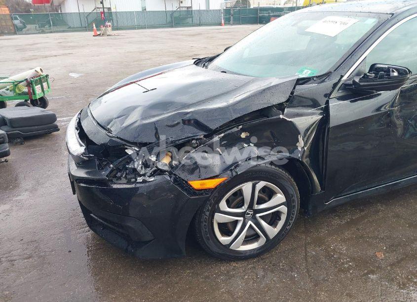 Photo 6 of 2018 Honda Civic LX (VIN 19XFC2F51JE022839)