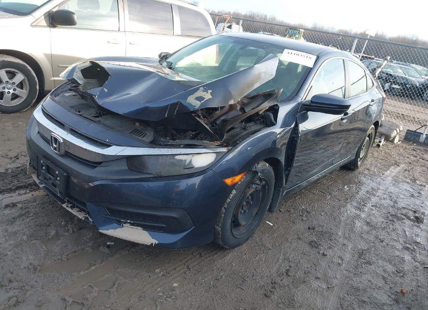 Photo 2 of 2018 Honda Civic LX (VIN 19XFC2F51JE024736)